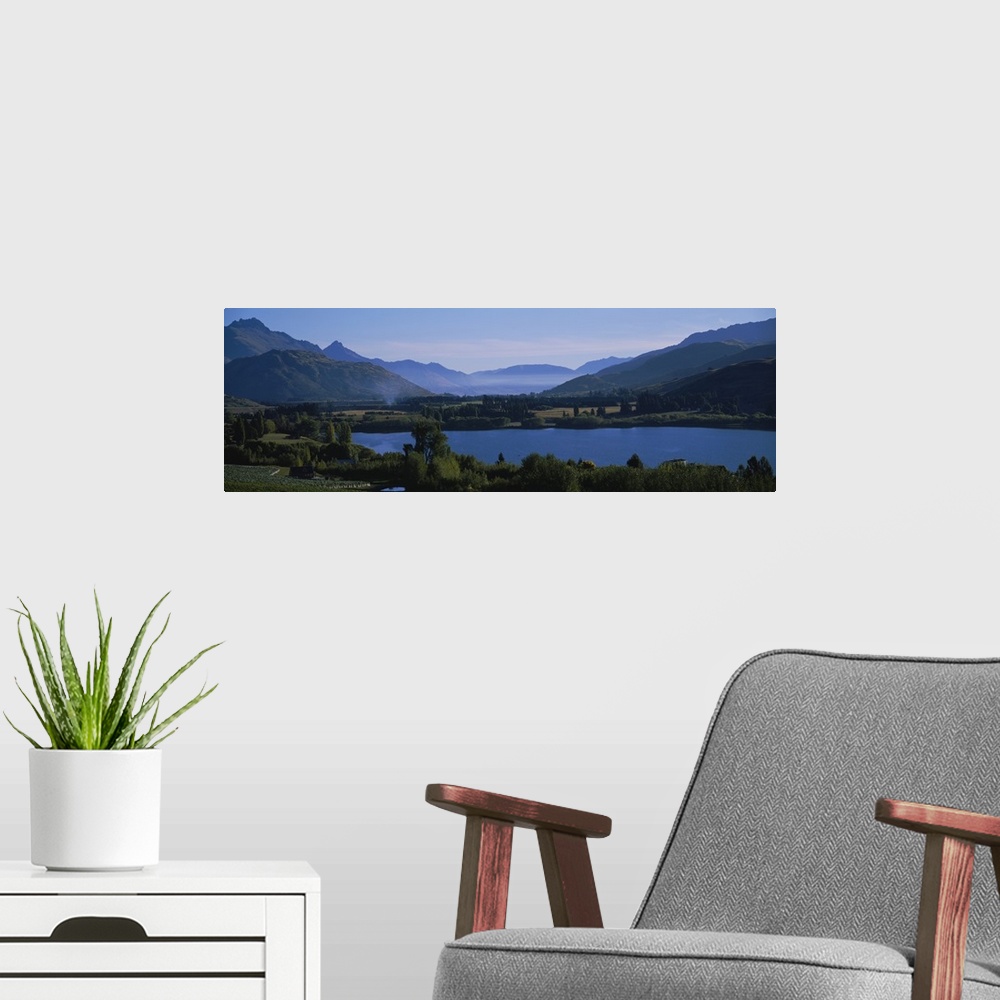 A modern room featuring High angle view of a lake, Lake Hayes, Mt Richardson, South Island New Zealand, New Zealand