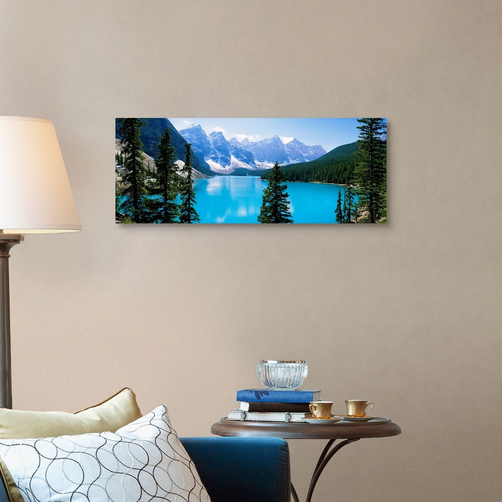 A traditional room featuring Panoramic photograph of the Valley of Ten Peaks that is located on Moraine Lake within Banff Nati...