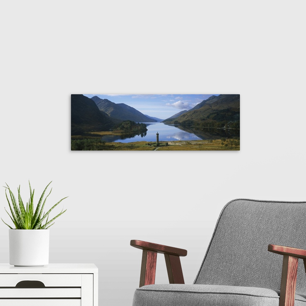 A modern room featuring High angle view of a monument near a lake, Glenfinnan Monument, Loch Shiel, Highlands Region, Sco...