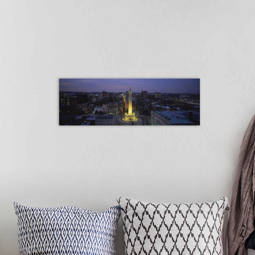 A bohemian room featuring View from above of the Washington Monument lit up in Baltimore, Maryland.