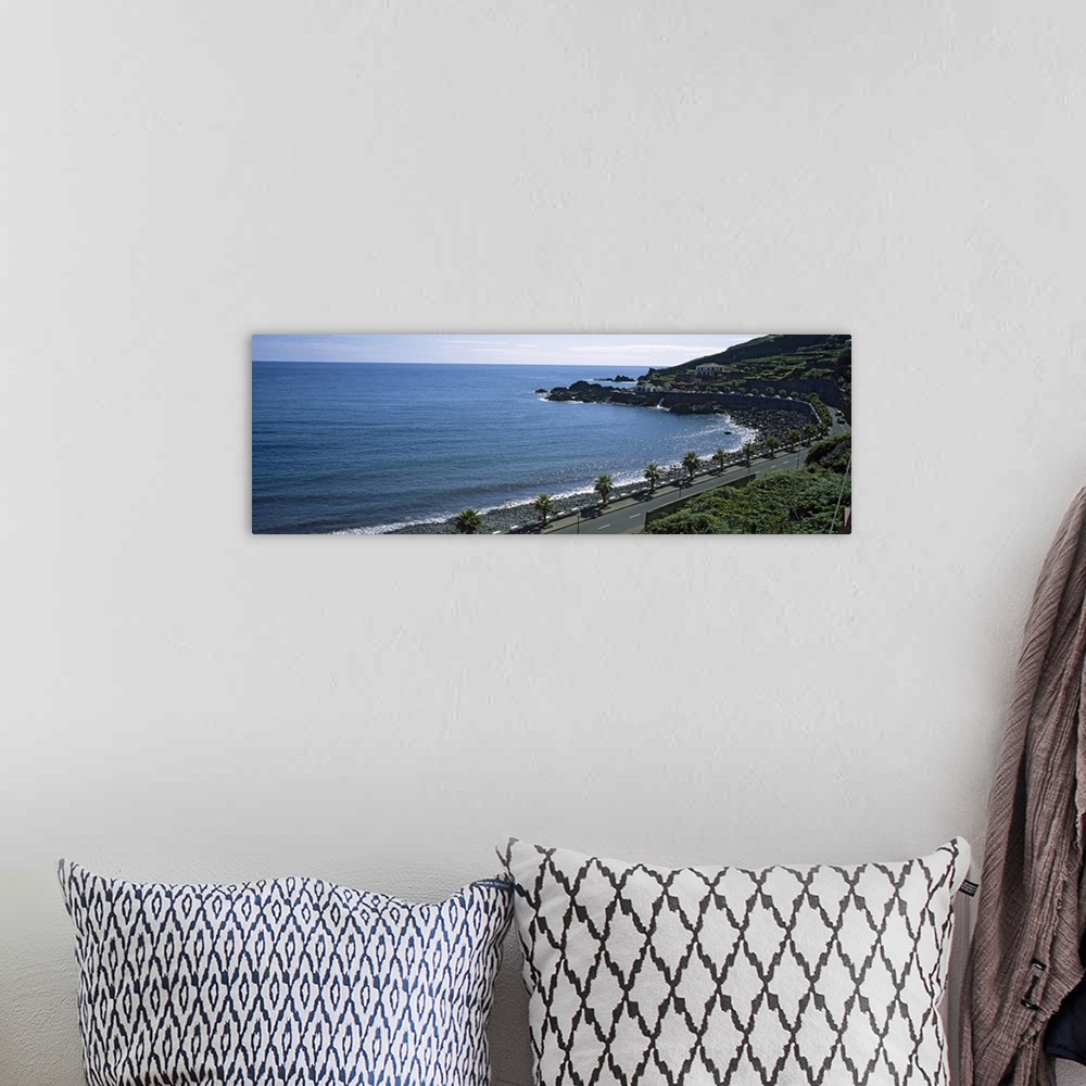 A bohemian room featuring High angle view of a road along the coast, Seixal, Madeira, Portugal
