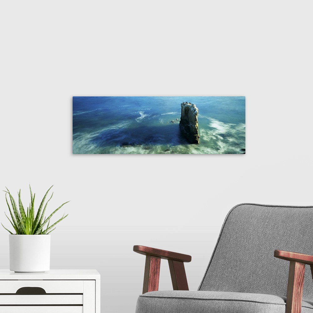 A modern room featuring High angle view of a rock formation in the sea, Santa Cruz, California
