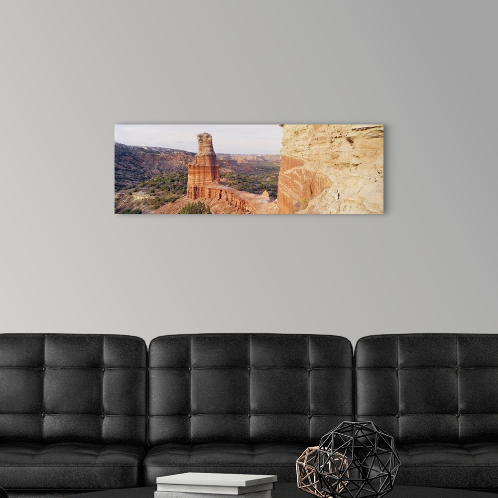 A modern room featuring Long photo print of rock formations in the desert in Texas.
