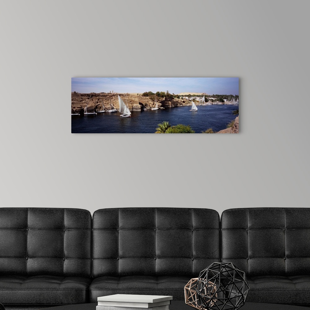 A modern room featuring High angle view of a sailboat in a river, Nile River, Aswan, Egypt