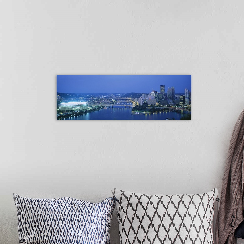 A bohemian room featuring Panoramic photograph taken from an aerial view overlooking a busy city that sits next to the Ohio...