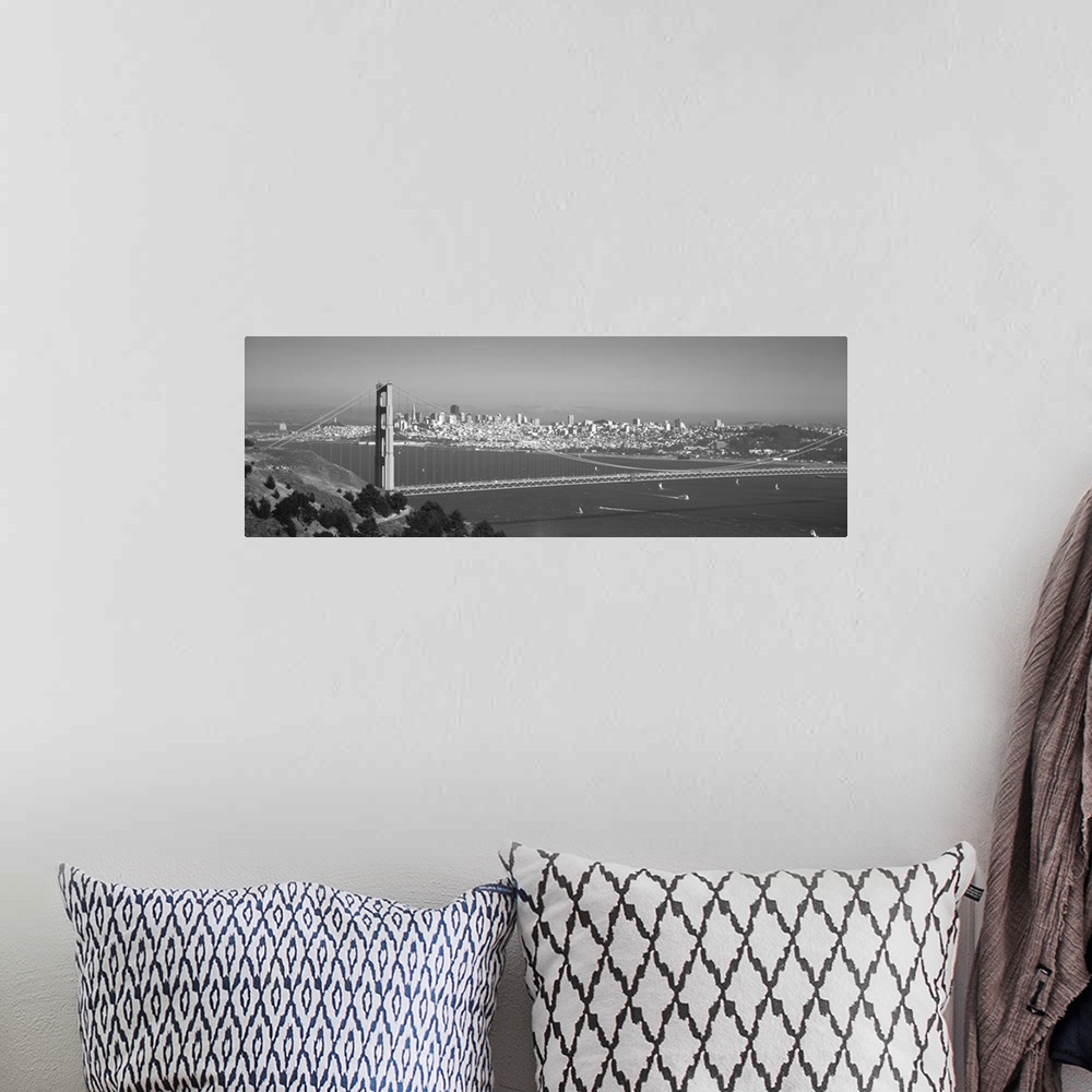 A bohemian room featuring Panoramic photograph of iconic west coast city overpass with city skyline in the distance on a fo...