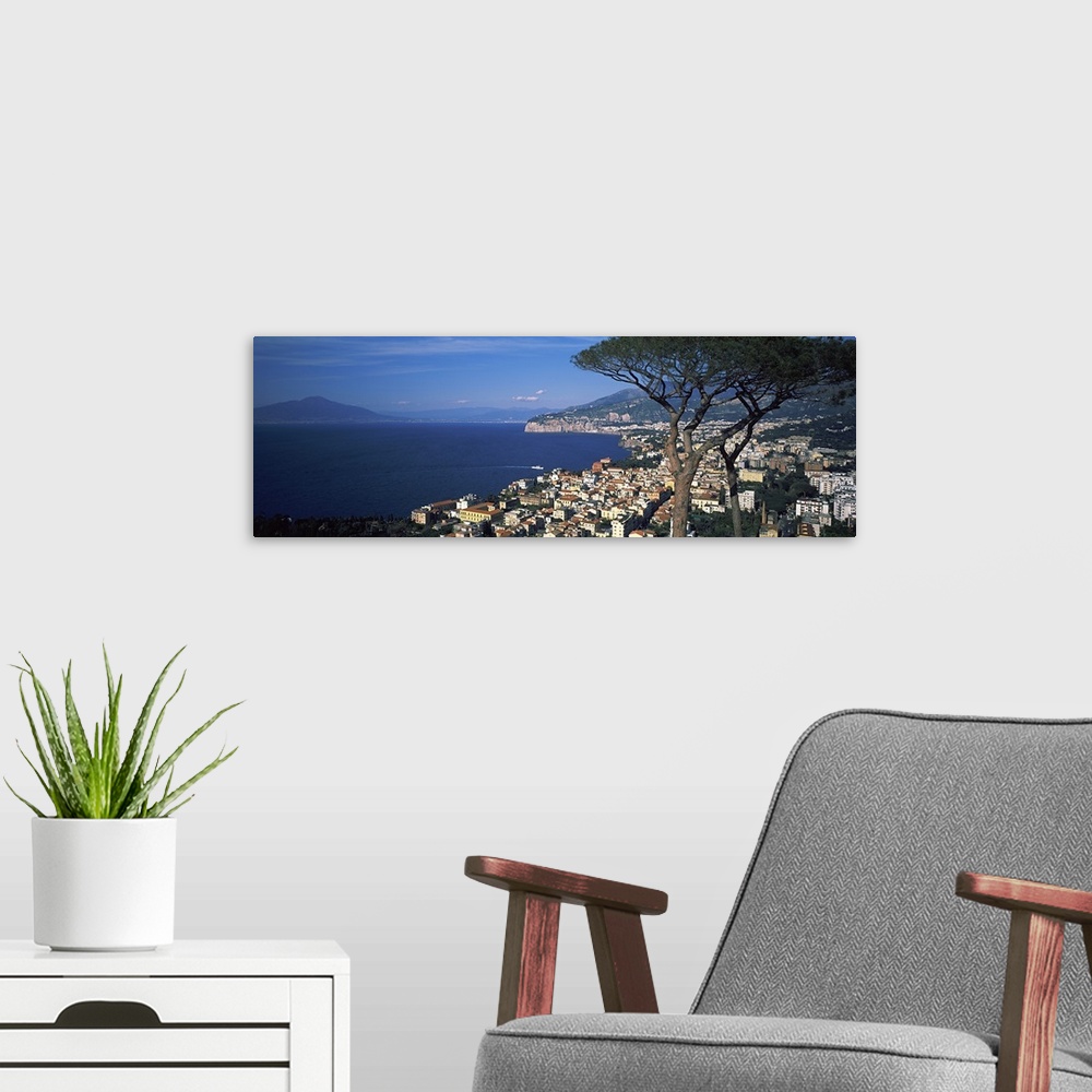 A modern room featuring High angle view of a town at a coast, Sorrento, Campania, Italy