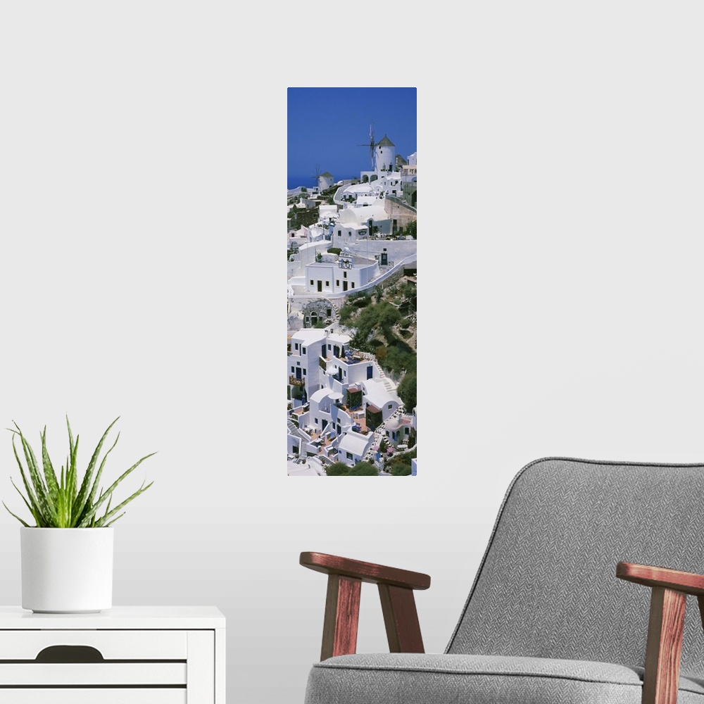 A modern room featuring High angle view of a town, Oia, Santorini, Cyclades Islands, Greece