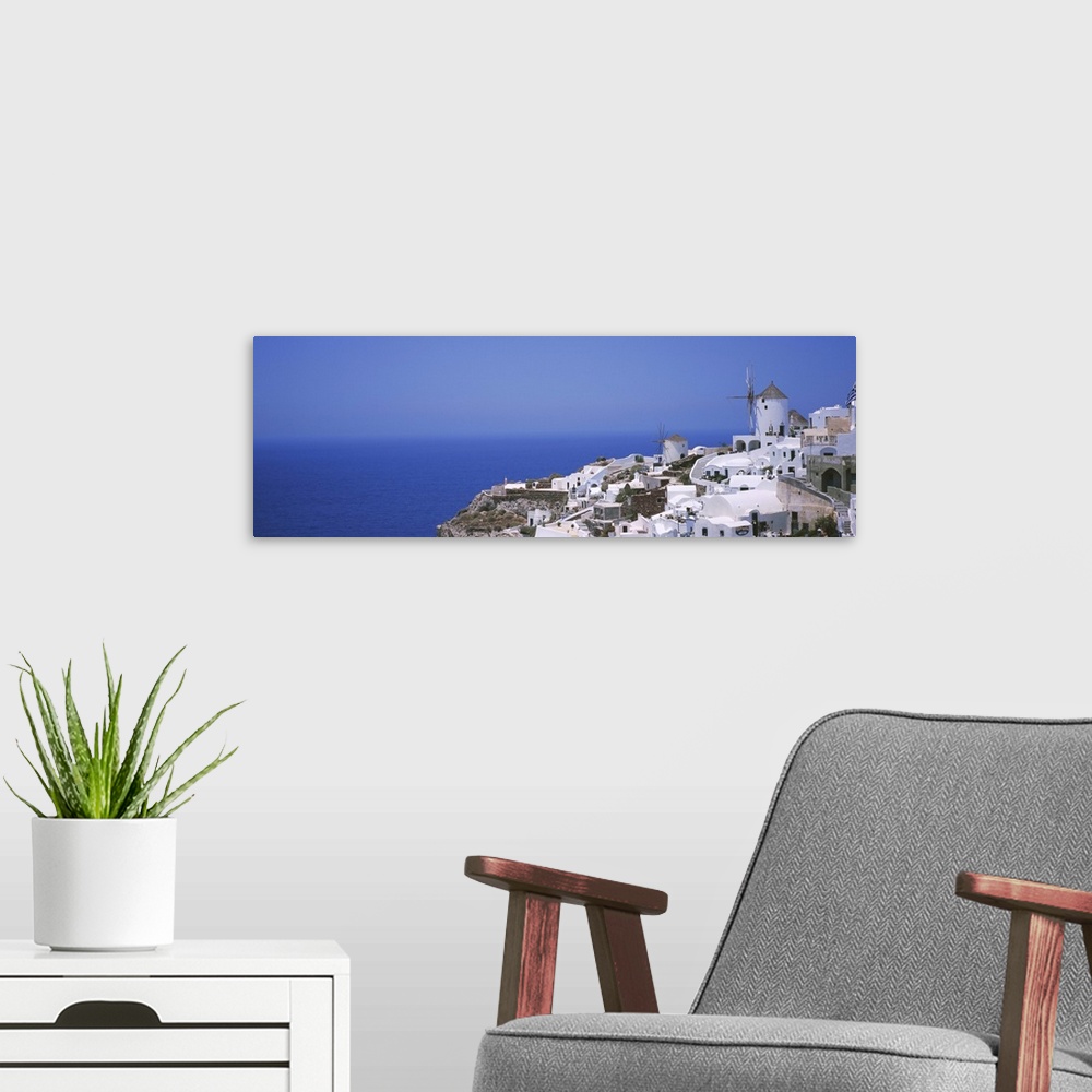 A modern room featuring High angle view of a town, Oia, Santorini, Greece