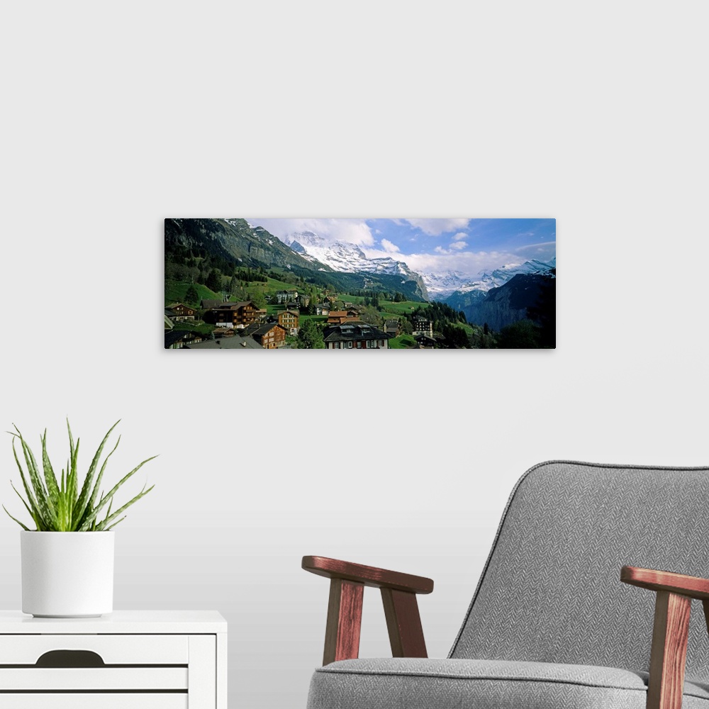 A modern room featuring High angle view of a village on a hillside, Wengen, Switzerland