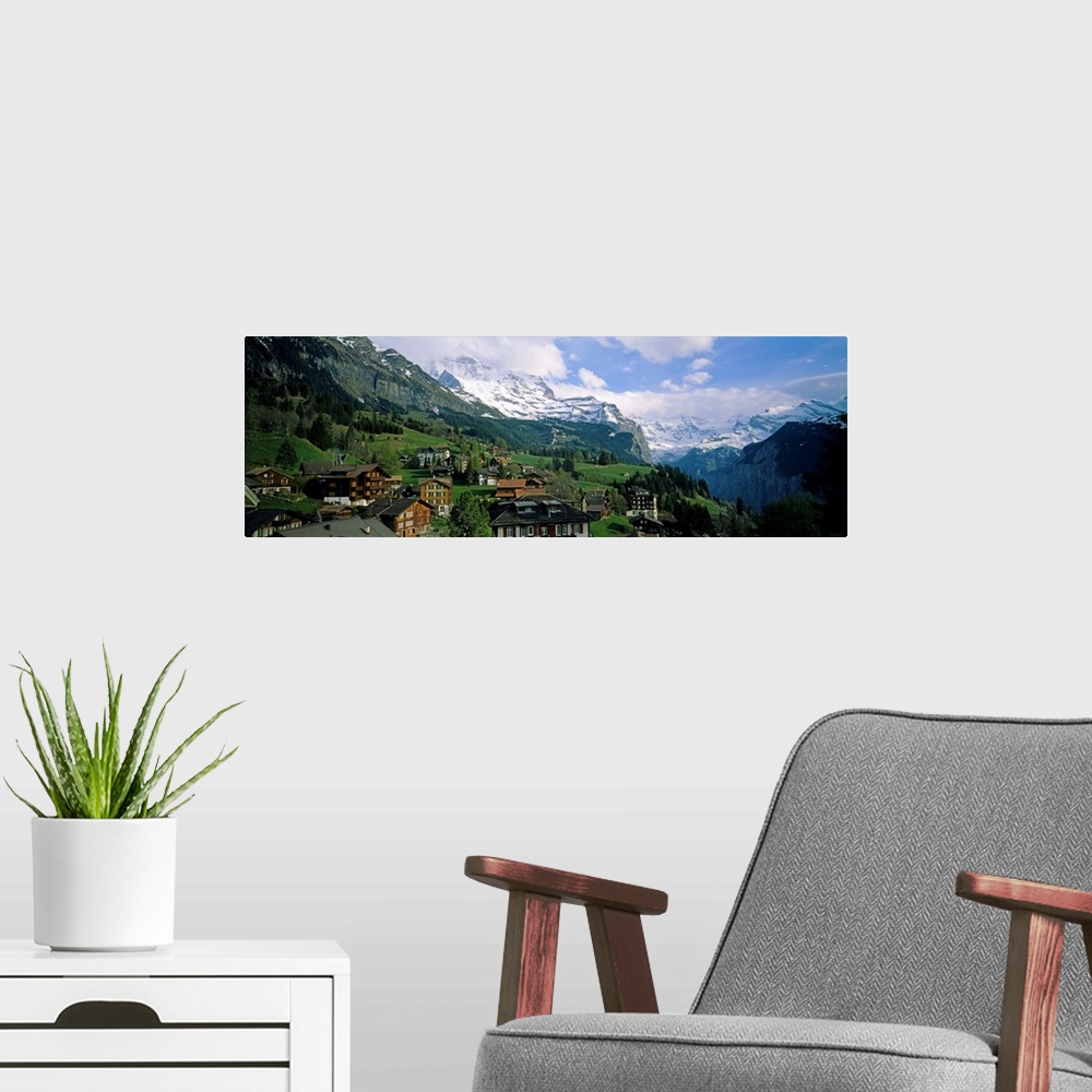 A modern room featuring High angle view of a village on a hillside, Wengen, Switzerland