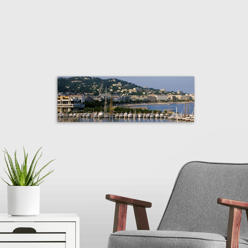 A modern room featuring High angle view of boats docked at harbor, Cannes, France