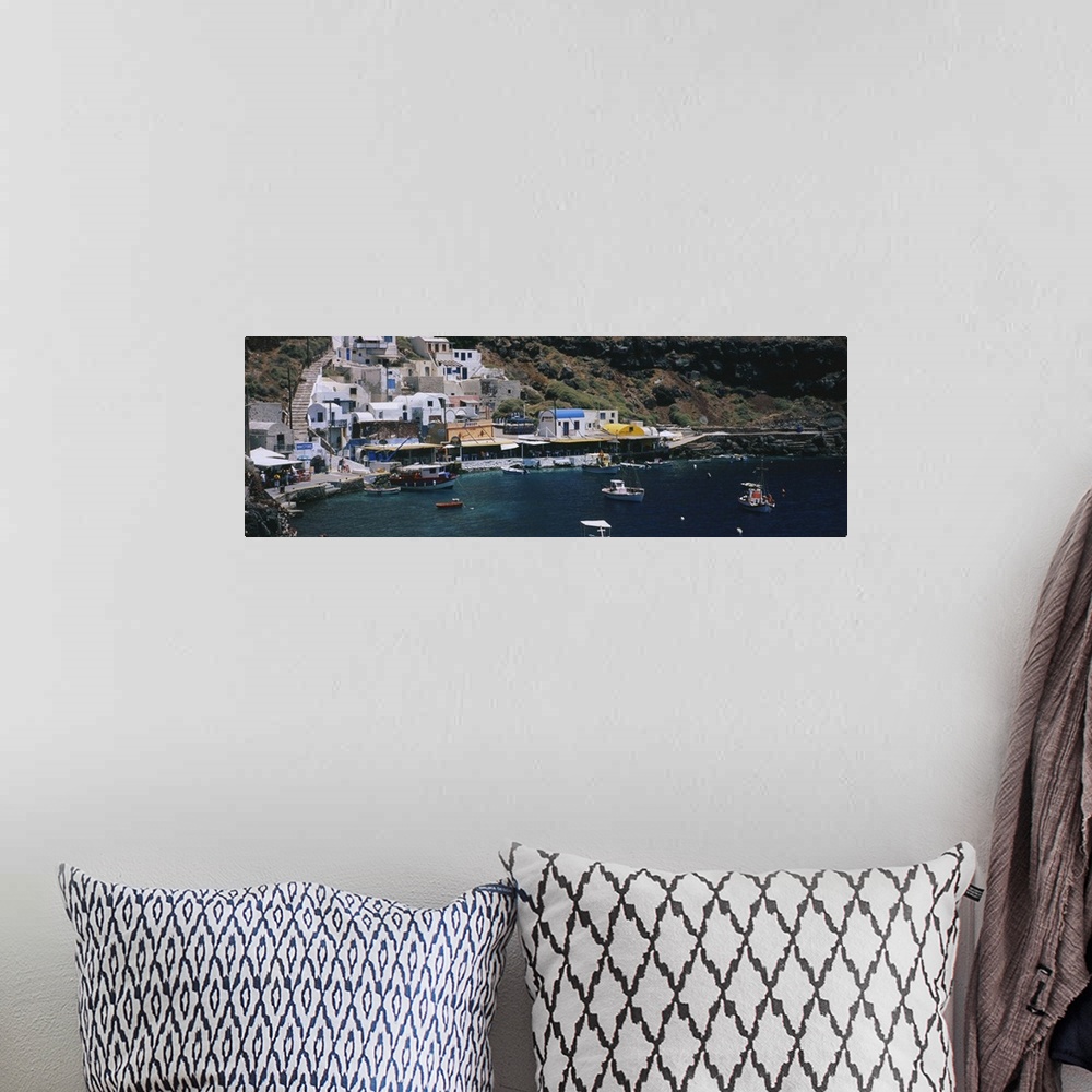 A bohemian room featuring High angle view of boats in the sea, Ammoudi Bay, Oia, Santorini, Greece