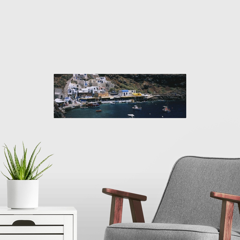 A modern room featuring High angle view of boats in the sea, Ammoudi Bay, Oia, Santorini, Greece