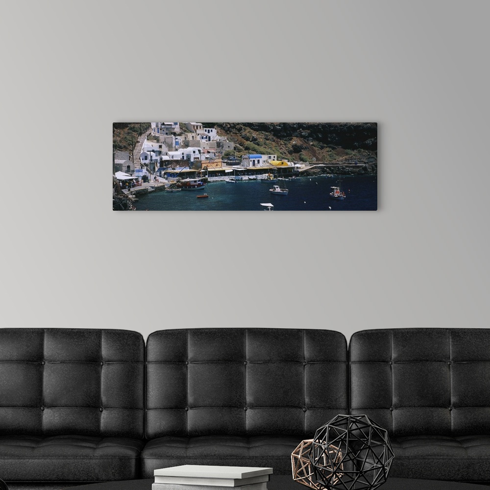 A modern room featuring High angle view of boats in the sea, Ammoudi Bay, Oia, Santorini, Greece