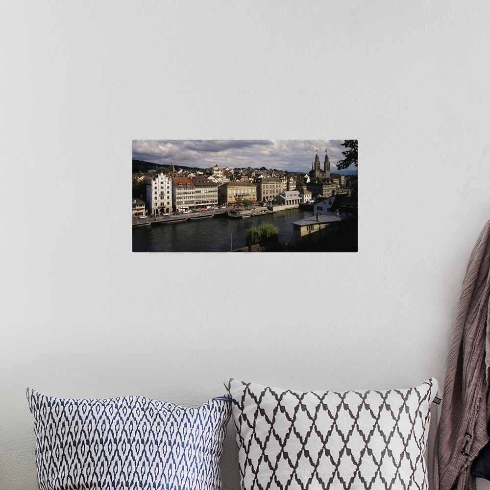 A bohemian room featuring High angle view of buildings along a river, River Limmat, Zurich, Switzerland