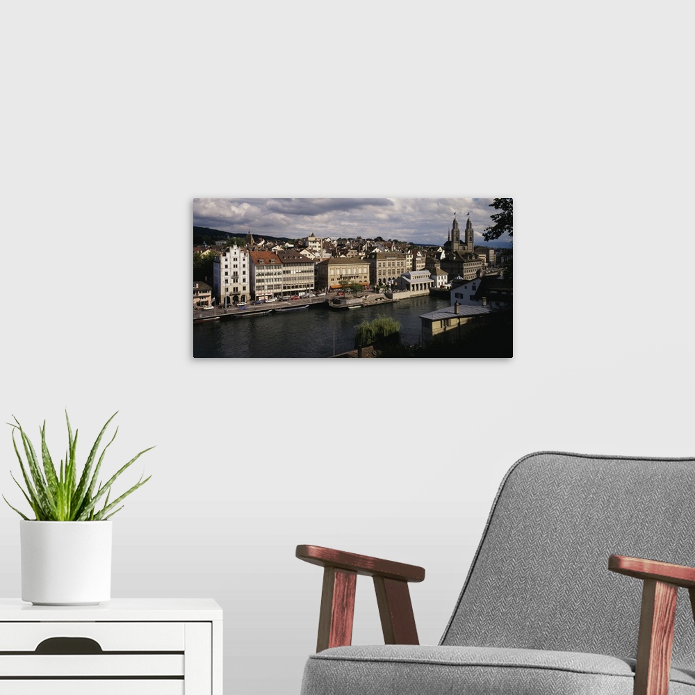 A modern room featuring High angle view of buildings along a river, River Limmat, Zurich, Switzerland