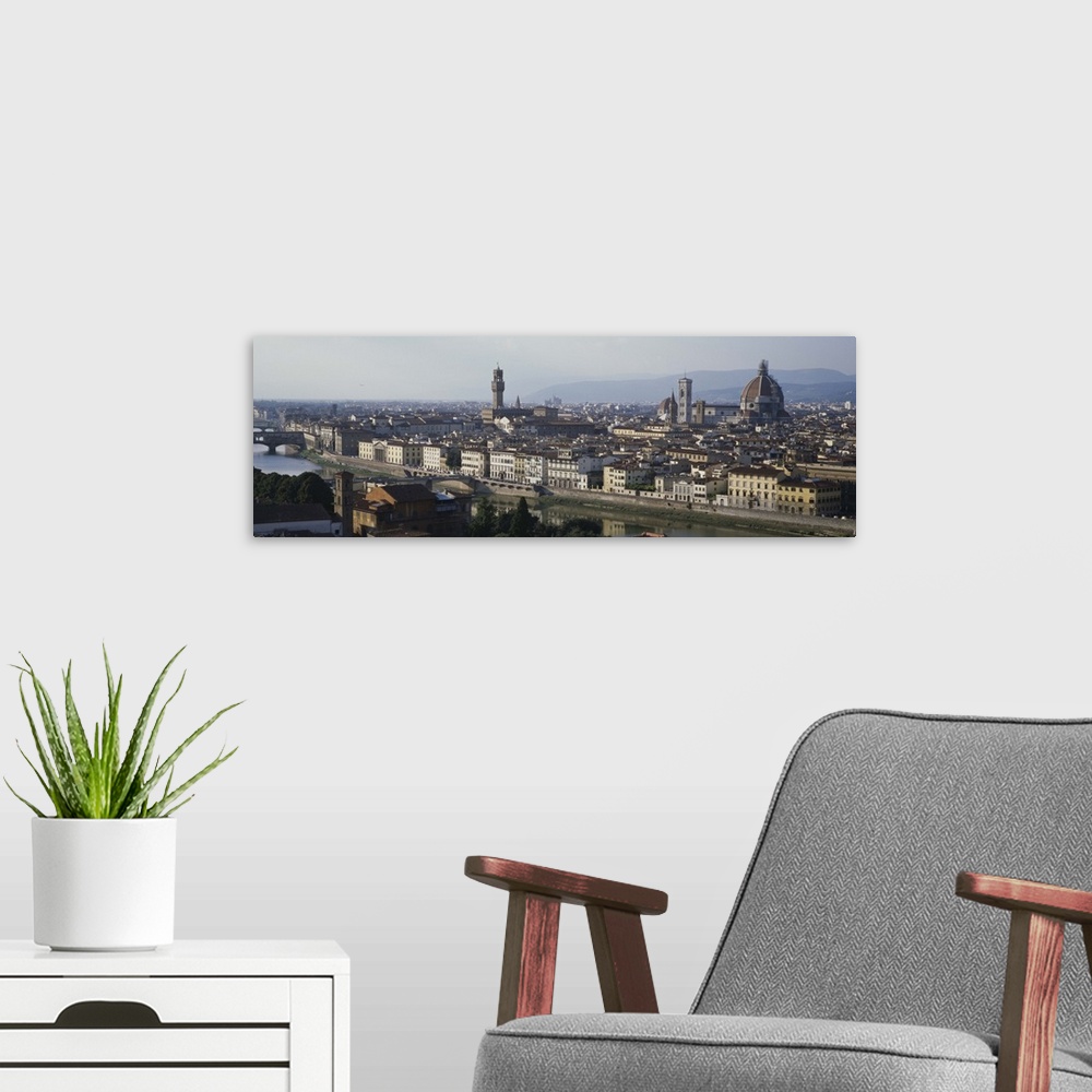 A modern room featuring High angle view of buildings in a city, Arno River, Florence, Tuscany, Italy