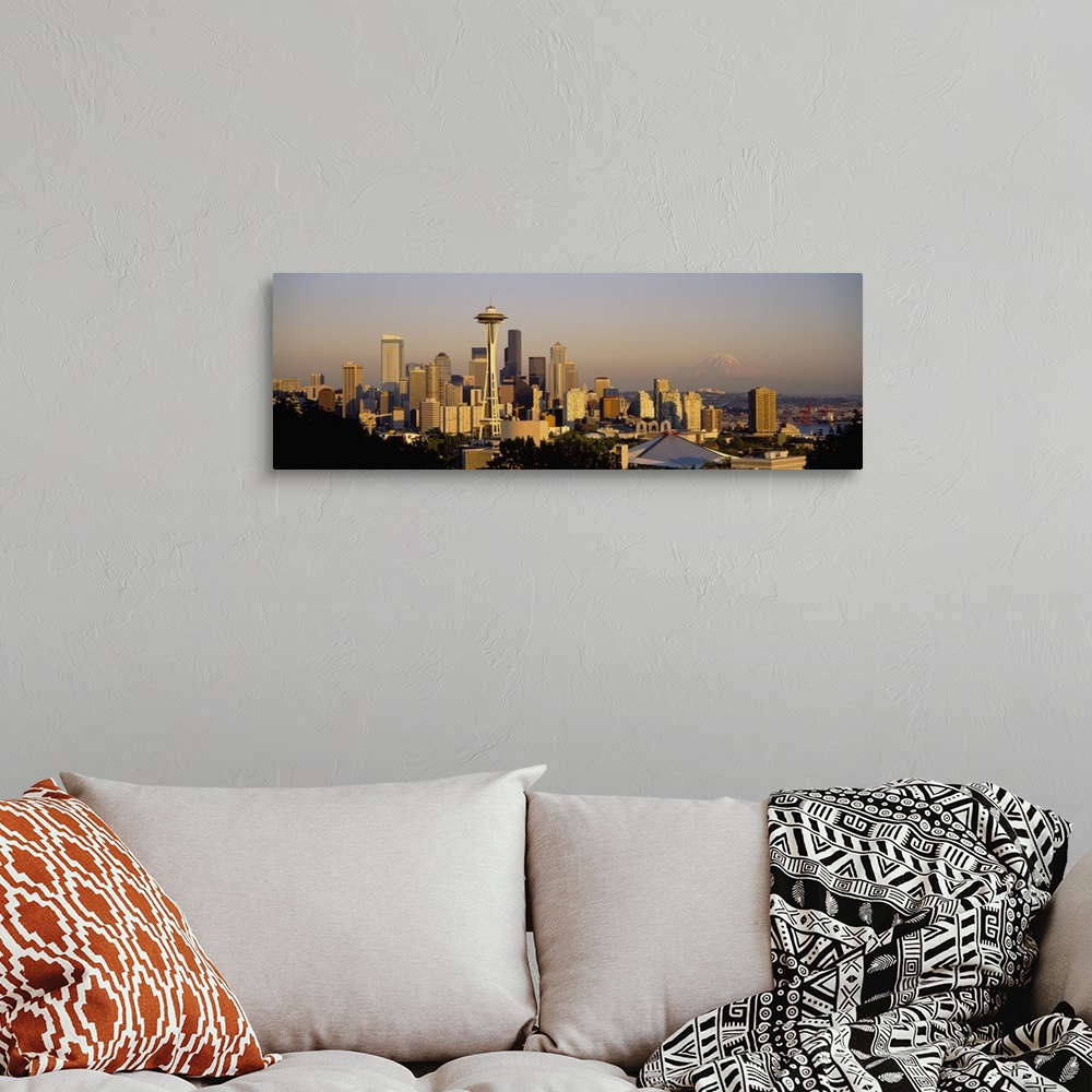 A bohemian room featuring Big, horizontal, high angle photograph of the Seattle skyline, Mount Rainier is slightly visible ...