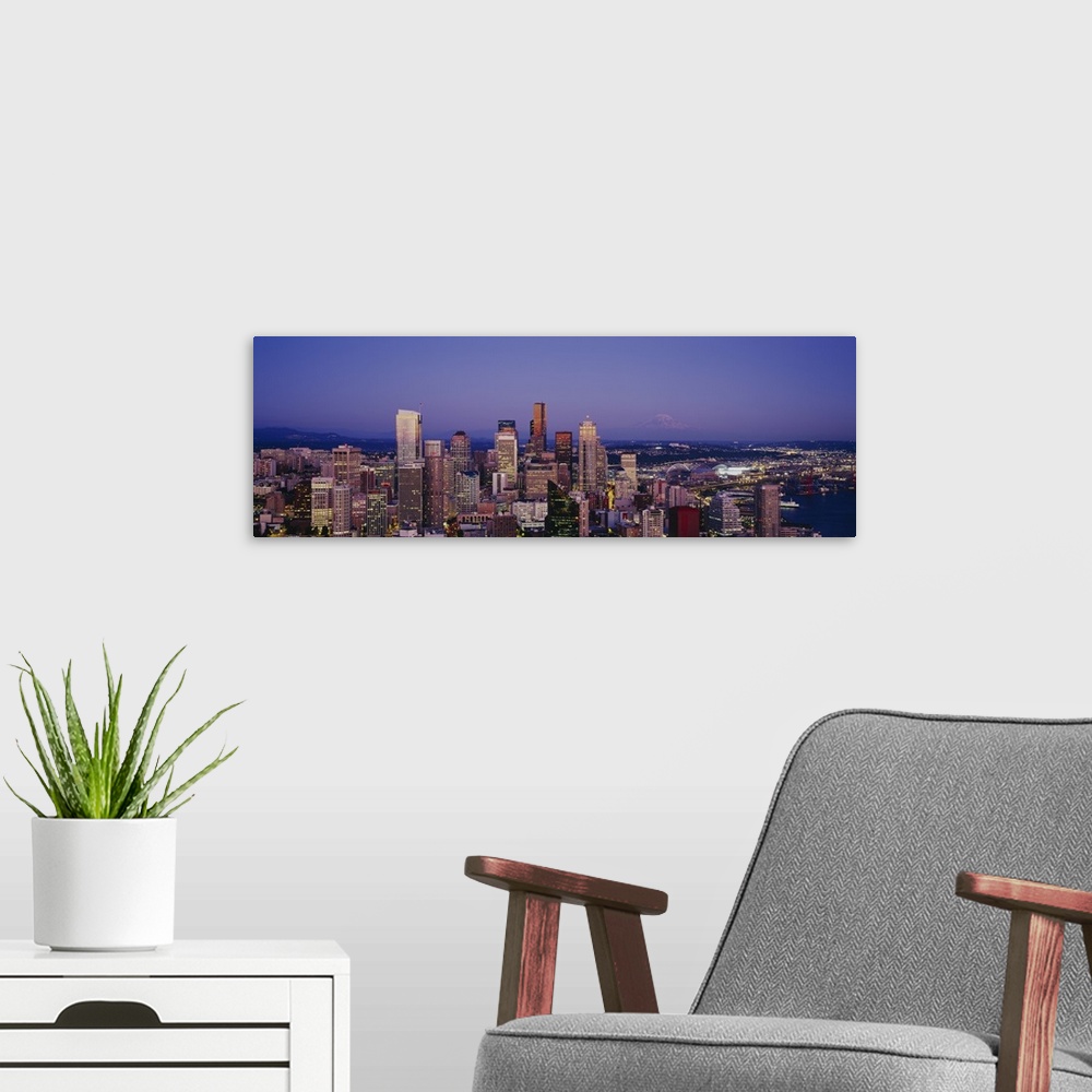 A modern room featuring High angle view of buildings lit up at dusk, Seattle, Washington State