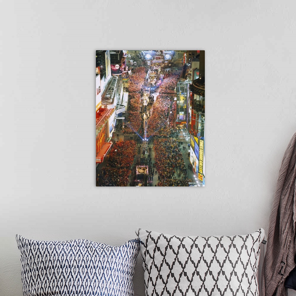 A bohemian room featuring Photograph of iconic city block in the ""Big Apple"" and night that is crowded with people waitin...