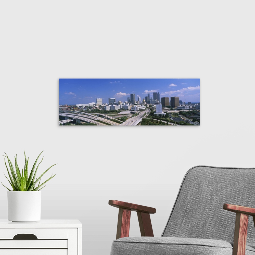 A modern room featuring High angle view of elevated roads with buildings in the background, Atlanta, Georgia
