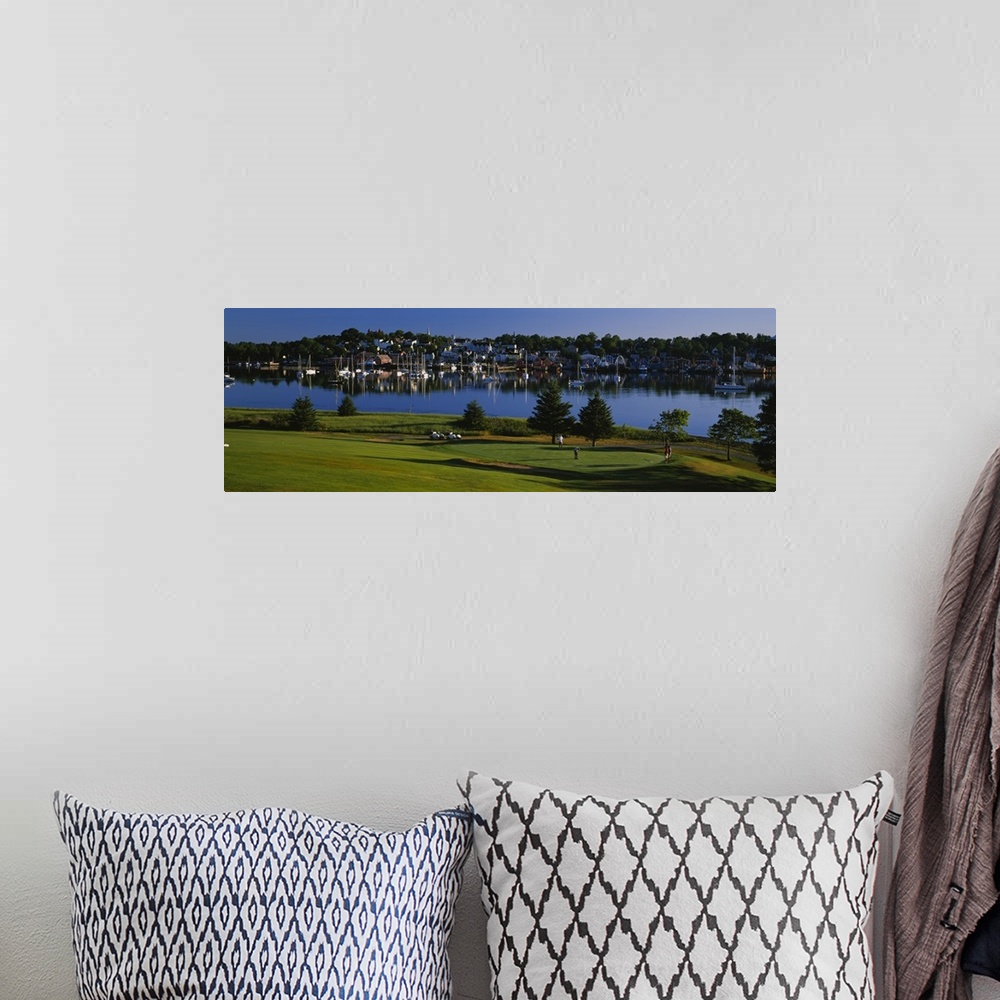 A bohemian room featuring High angle view of four people playing golf at a golf course,Lunenburg Harbor, Lunenburg, Nova Sc...