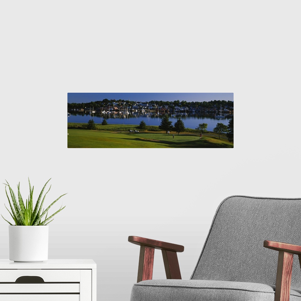 A modern room featuring High angle view of four people playing golf at a golf course,Lunenburg Harbor, Lunenburg, Nova Sc...