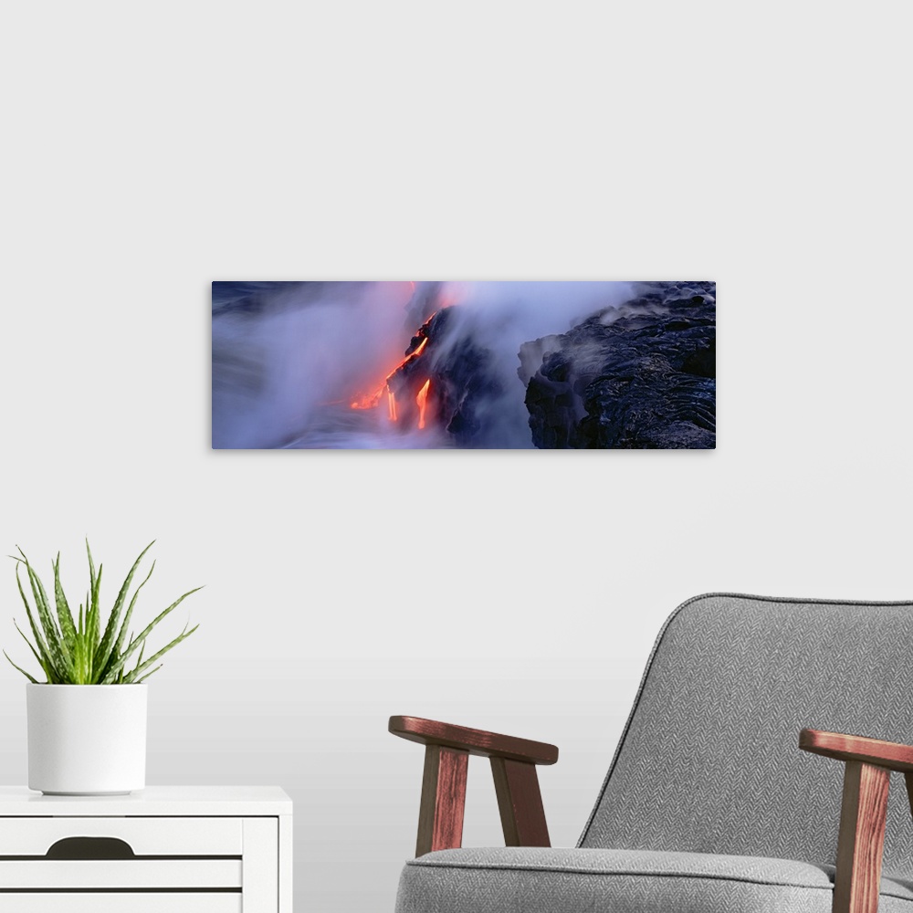 A modern room featuring High angle view of lava flowing into the Pacific Ocean, Volcano National Park, Hawaii