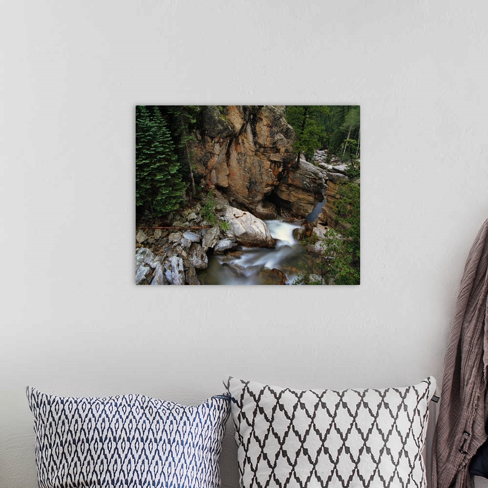 A bohemian room featuring Aerial photo of the mountains and forest surrounding the Roaring Fork River in White River Nation...