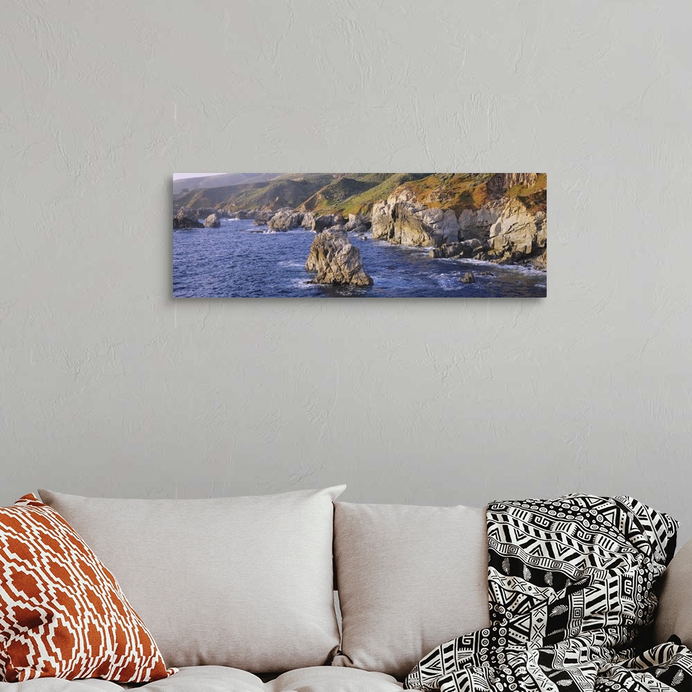 A bohemian room featuring High angle view of rock formations on the coast, Big Sur, Garrapata State Beach, Monterey Coast, ...