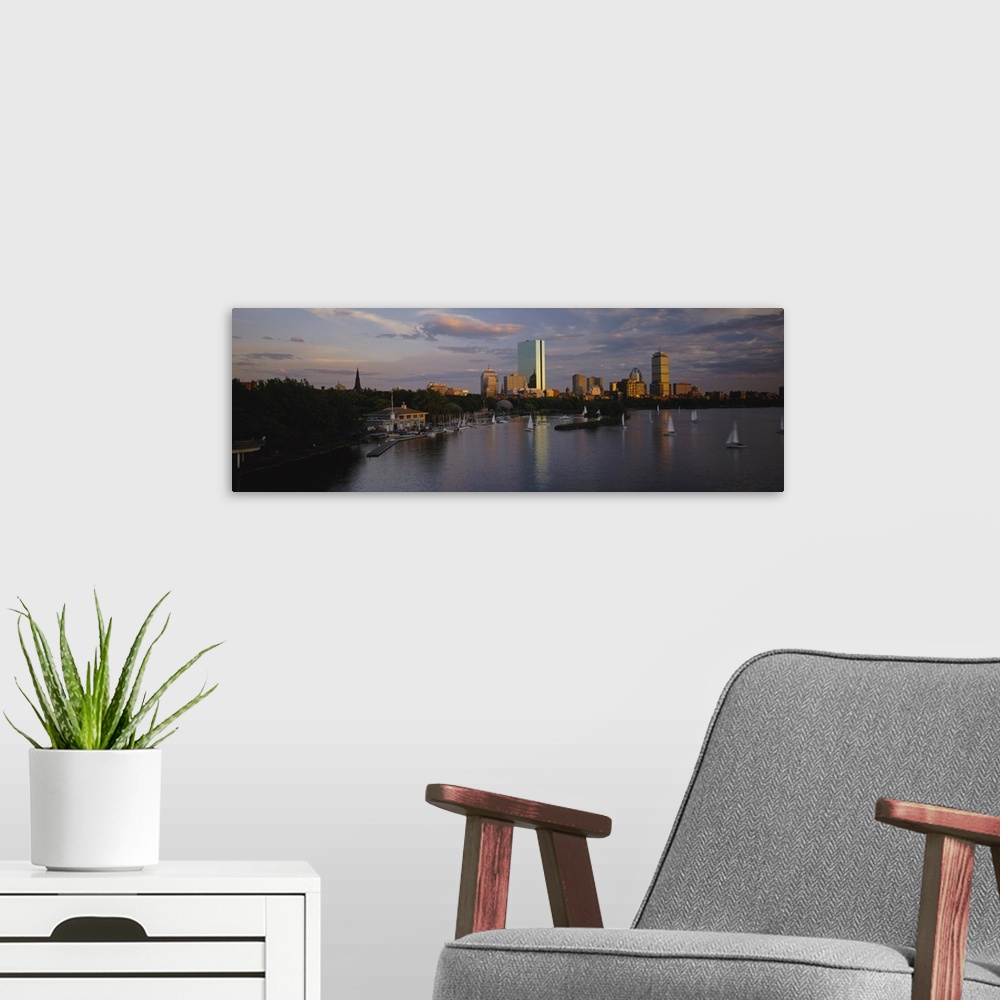 A modern room featuring Panoramic, high angle photograph of many sailboats in the waters in front of Back Bay, the Boston...