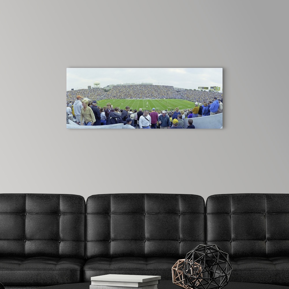 A modern room featuring High angle view of spectators in a football stadium, Iowa