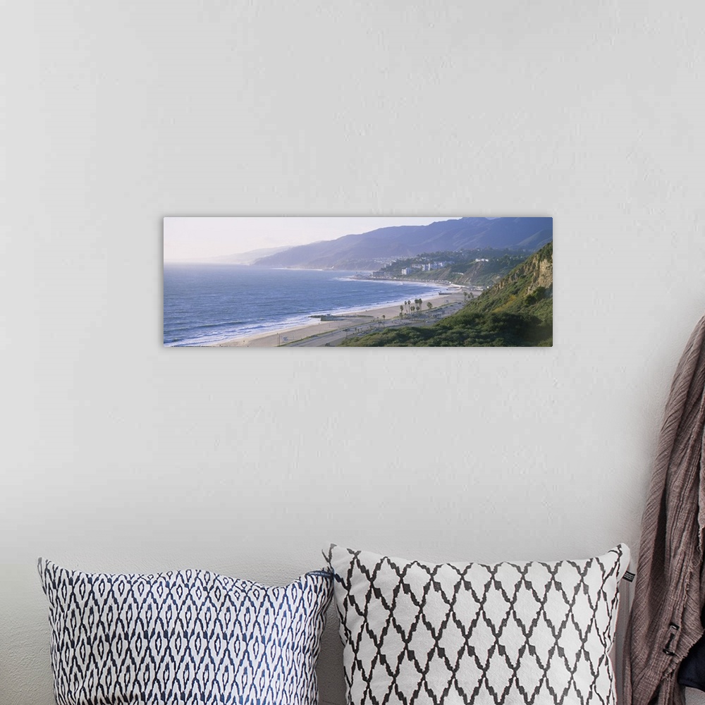 A bohemian room featuring Panorama of sandy shoreline on the West Coast with the hillside fading in to the early morning fog.