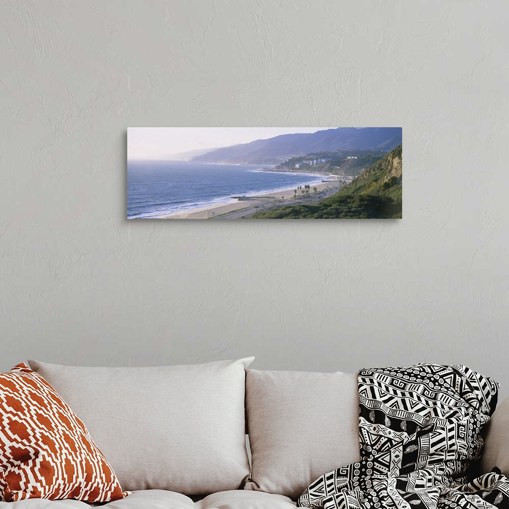 A bohemian room featuring Panorama of sandy shoreline on the West Coast with the hillside fading in to the early morning fog.