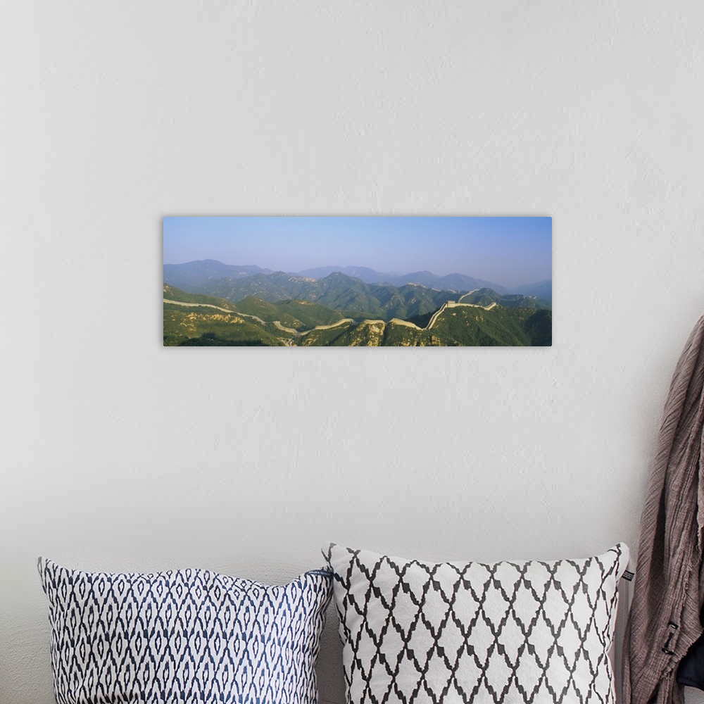 A bohemian room featuring High angle panorama of the mountains and the Great Wall of China.