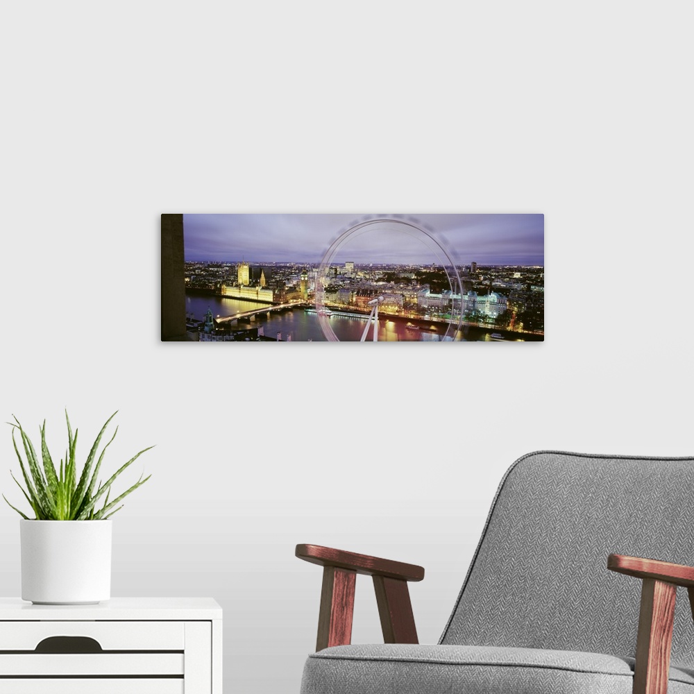 A modern room featuring This is a high angle view of the London Eye, also known as the Millennium Wheel. It is an observa...