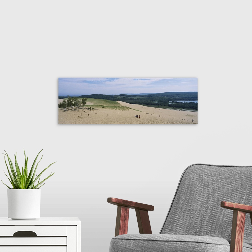A modern room featuring High angle view of tourists climbing sand dunes, Sleeping Bear Dunes National Lakeshore, Michigan