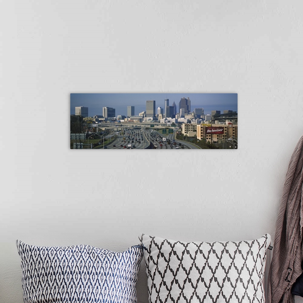 A bohemian room featuring Wide angle view of the skyline and roads leading into the city of Atlanta.