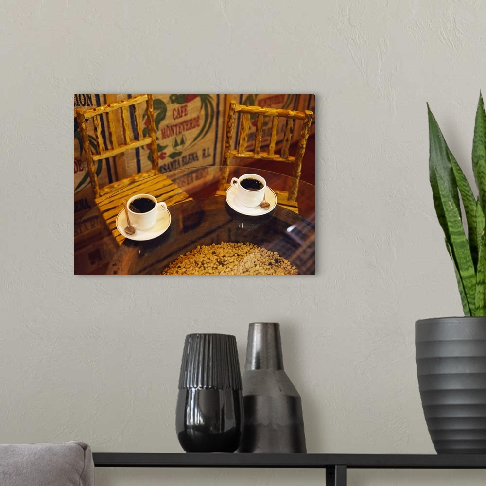 A modern room featuring High angle view of two cups of coffee on a table in a coffee shop, Monteverde, Puntarenas, Costa ...