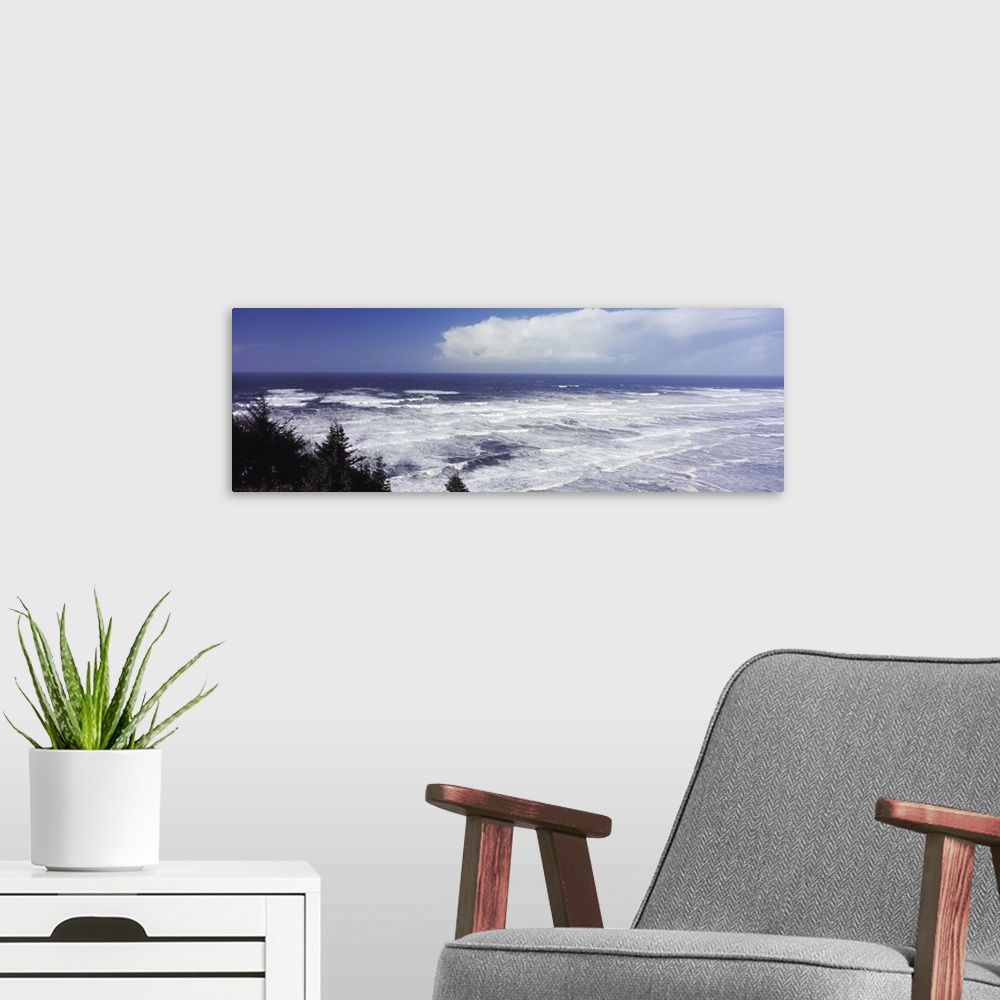 A modern room featuring High surf in Pacific Ocean Tillamook County Oregon