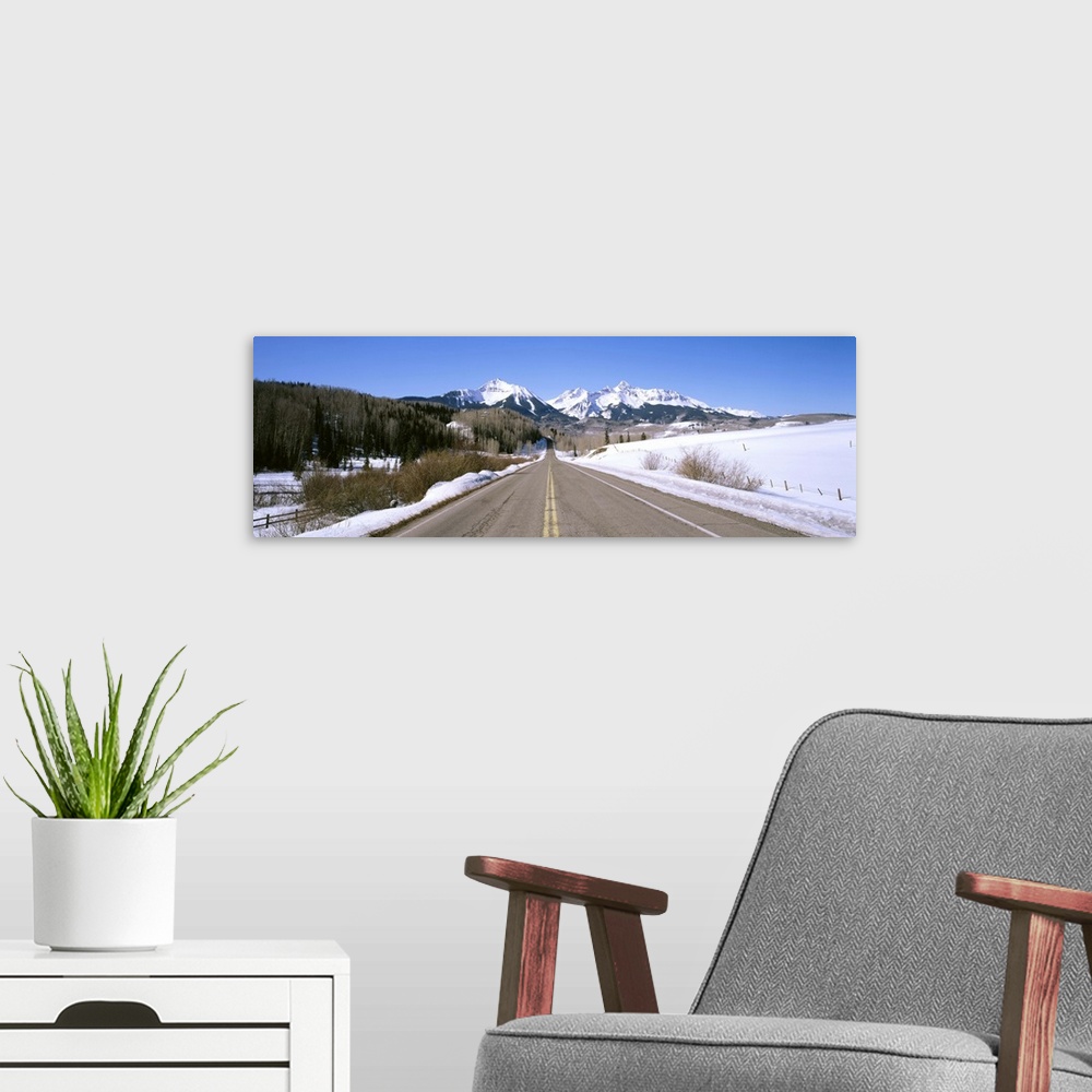 A modern room featuring Highway in front of snowcapped mountains, Telluride, Colorado
