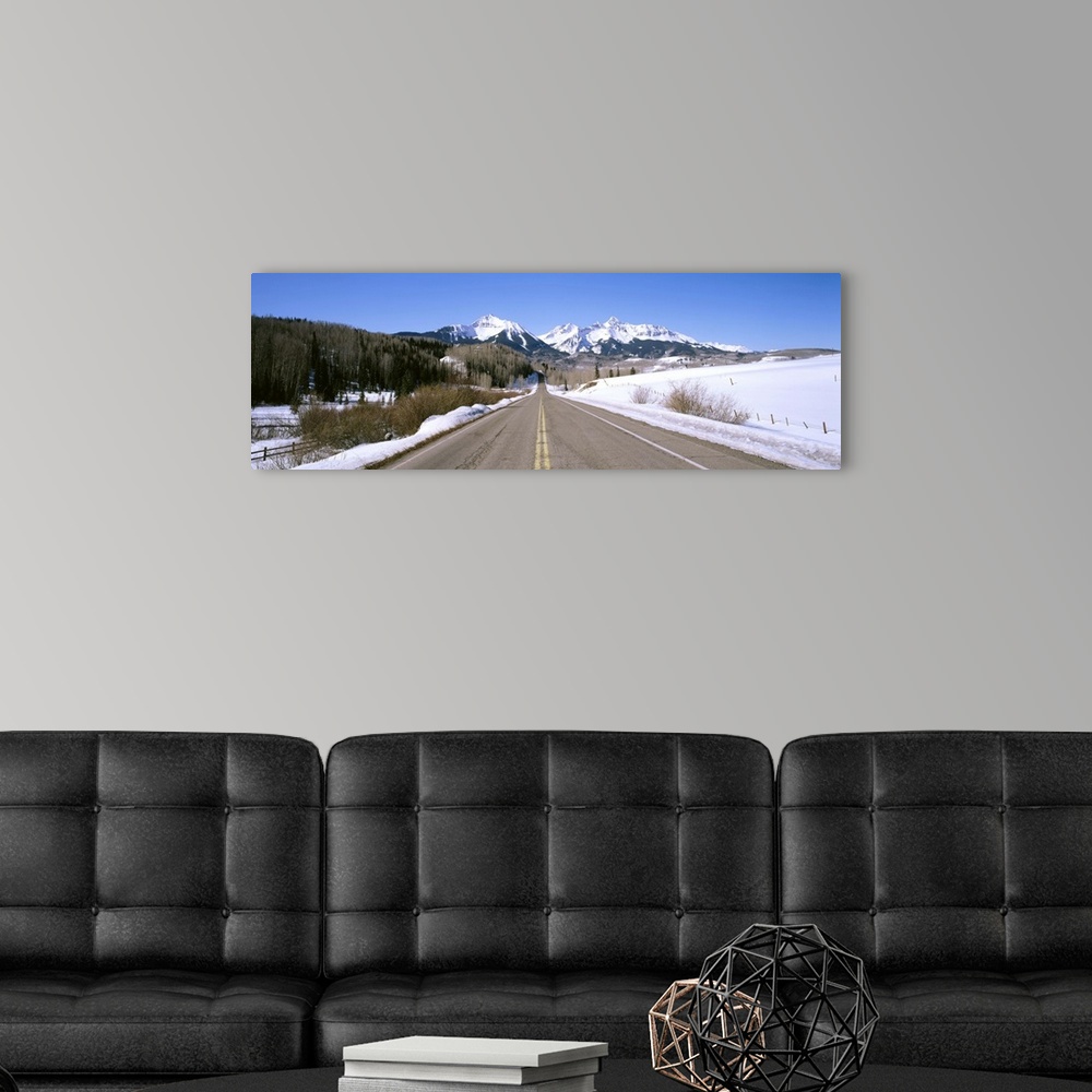 A modern room featuring Highway in front of snowcapped mountains, Telluride, Colorado