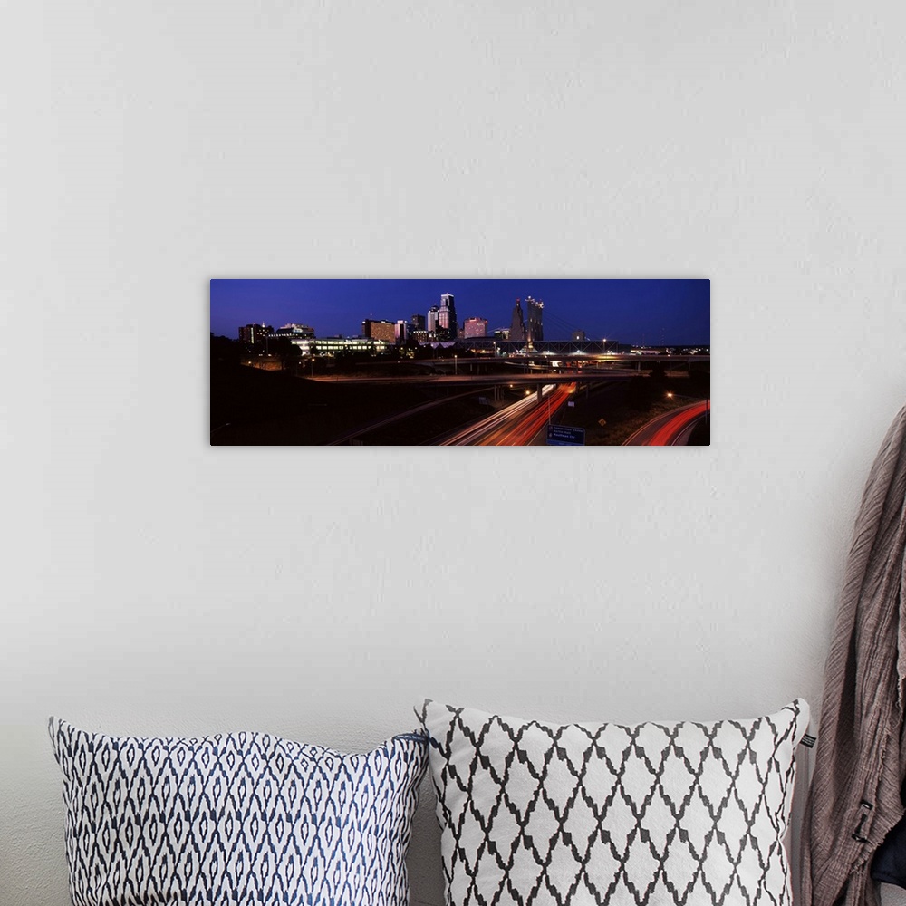 A bohemian room featuring Highway interchange and skyline at dusk, Kansas City, Missouri, USA