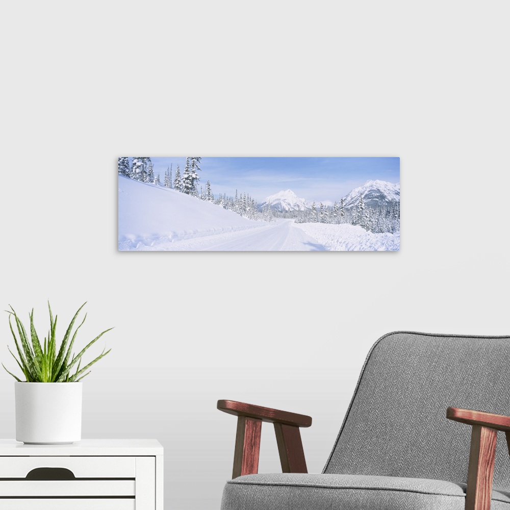 A modern room featuring Highway passing through a snow covered landscape, Alberta, Canada