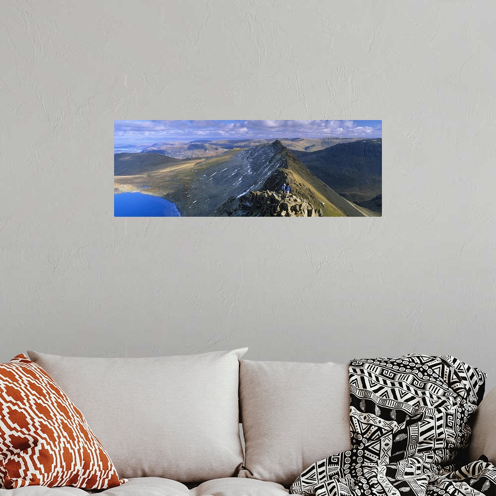 A bohemian room featuring Hikers hiking on a mountain, Striding Edge, Helvellyn, English Lake District, Cumbria, England