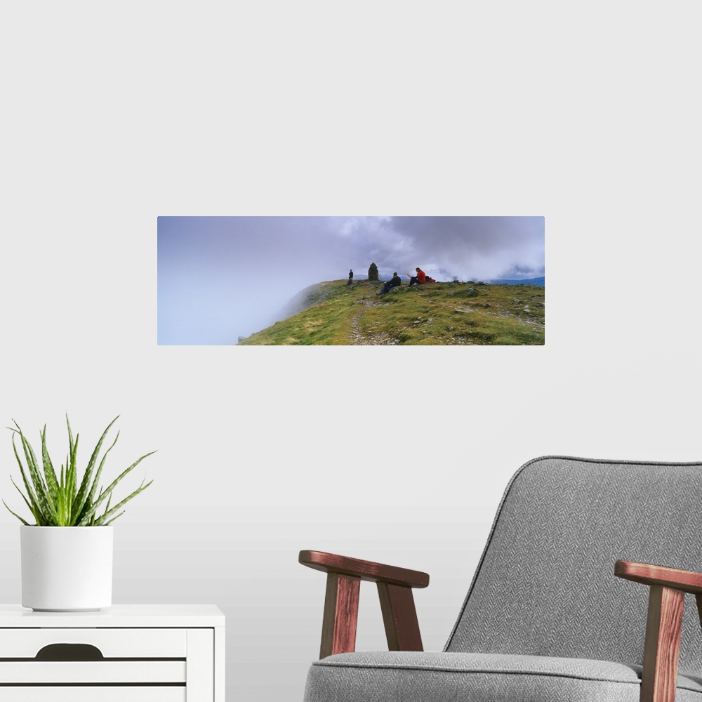 A modern room featuring Hikers on a hill, Dale Head, English Lake District, Cumbria, England