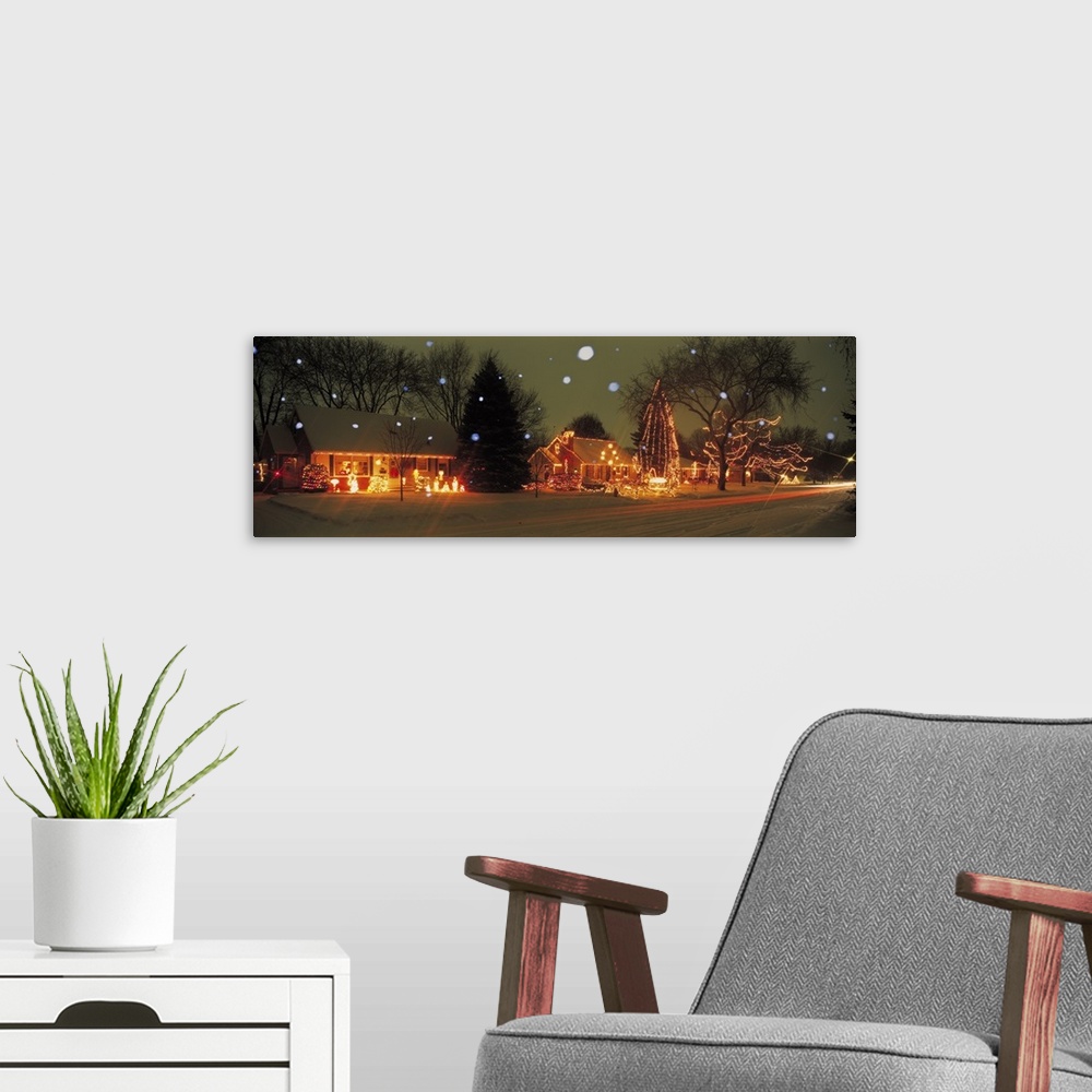 A modern room featuring A snowy holiday scene of festive lights in Minneapolis, Minnesota.