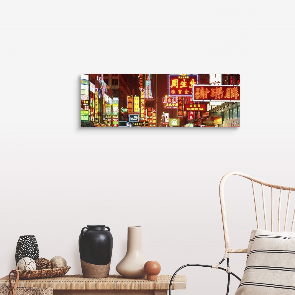A farmhouse room featuring Wide angle photograph on a large canvas of many brightly lit neon signs, at night in Hong Kong, C...
