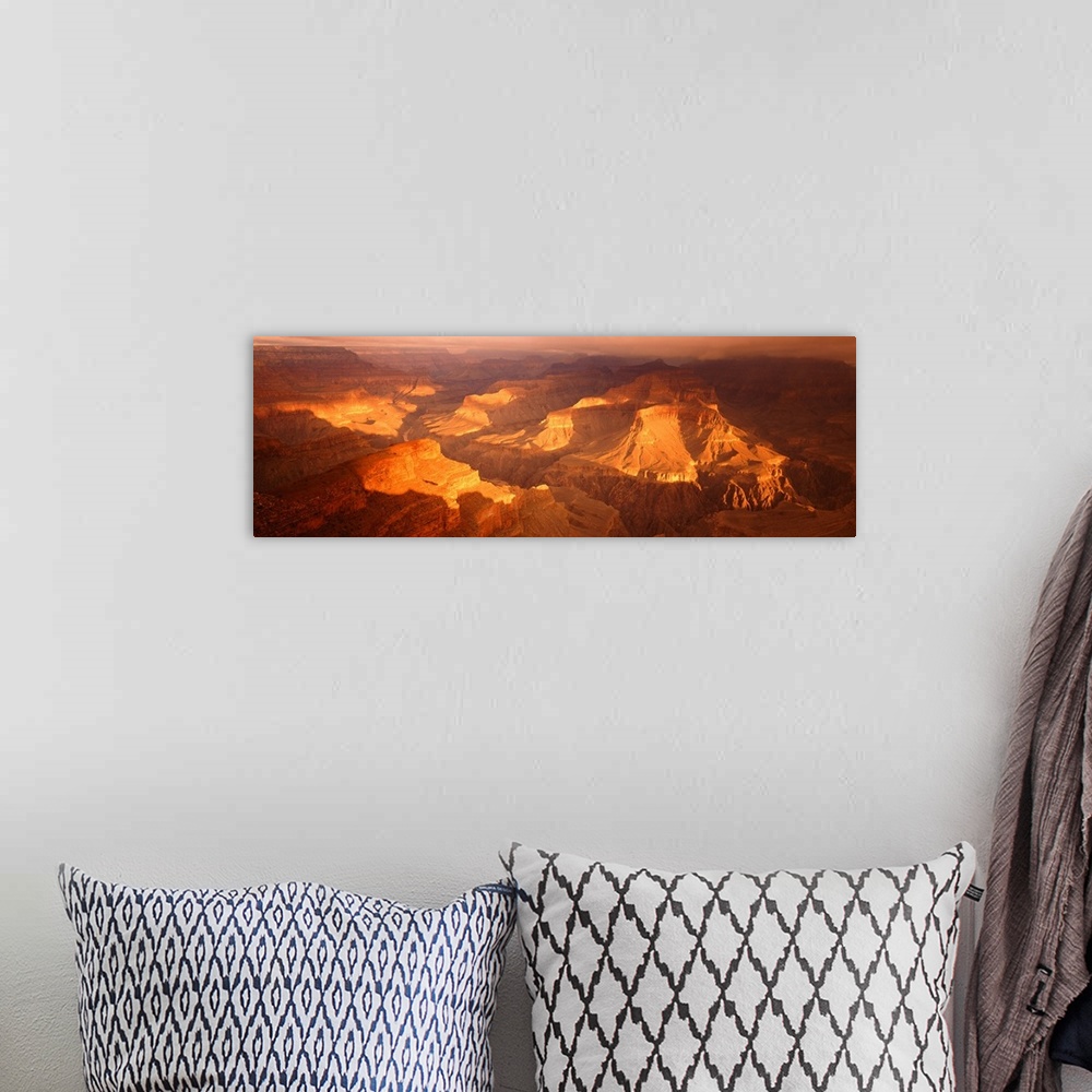 A bohemian room featuring Giant, horizontal, aerial photograph of Hopi Point Canyon in the golden sunlight, at the Grand Ca...
